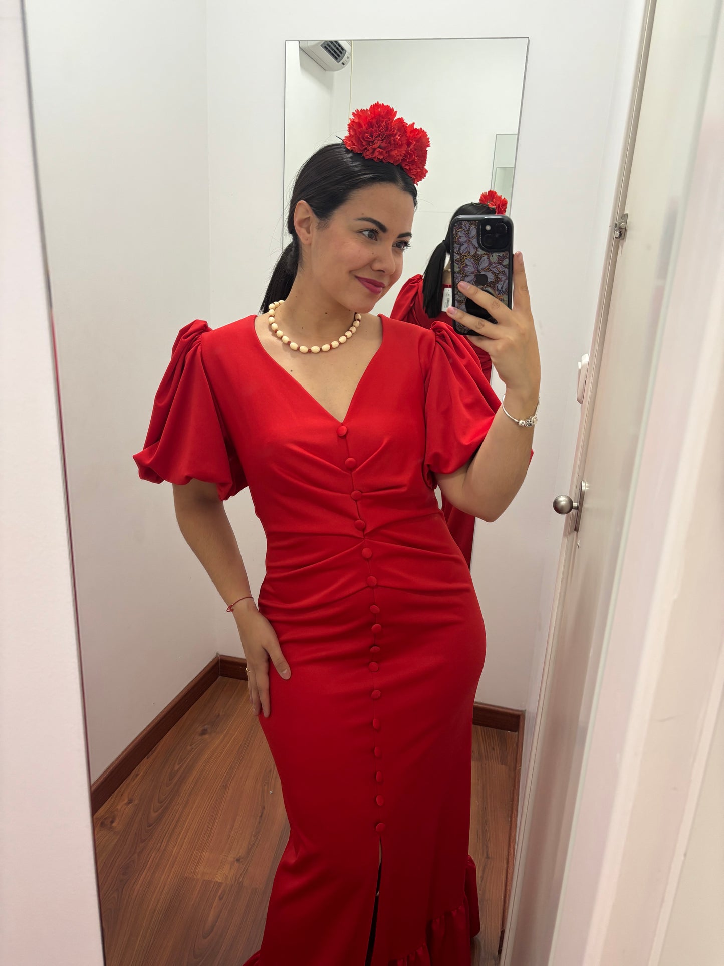 Bata botón rojo