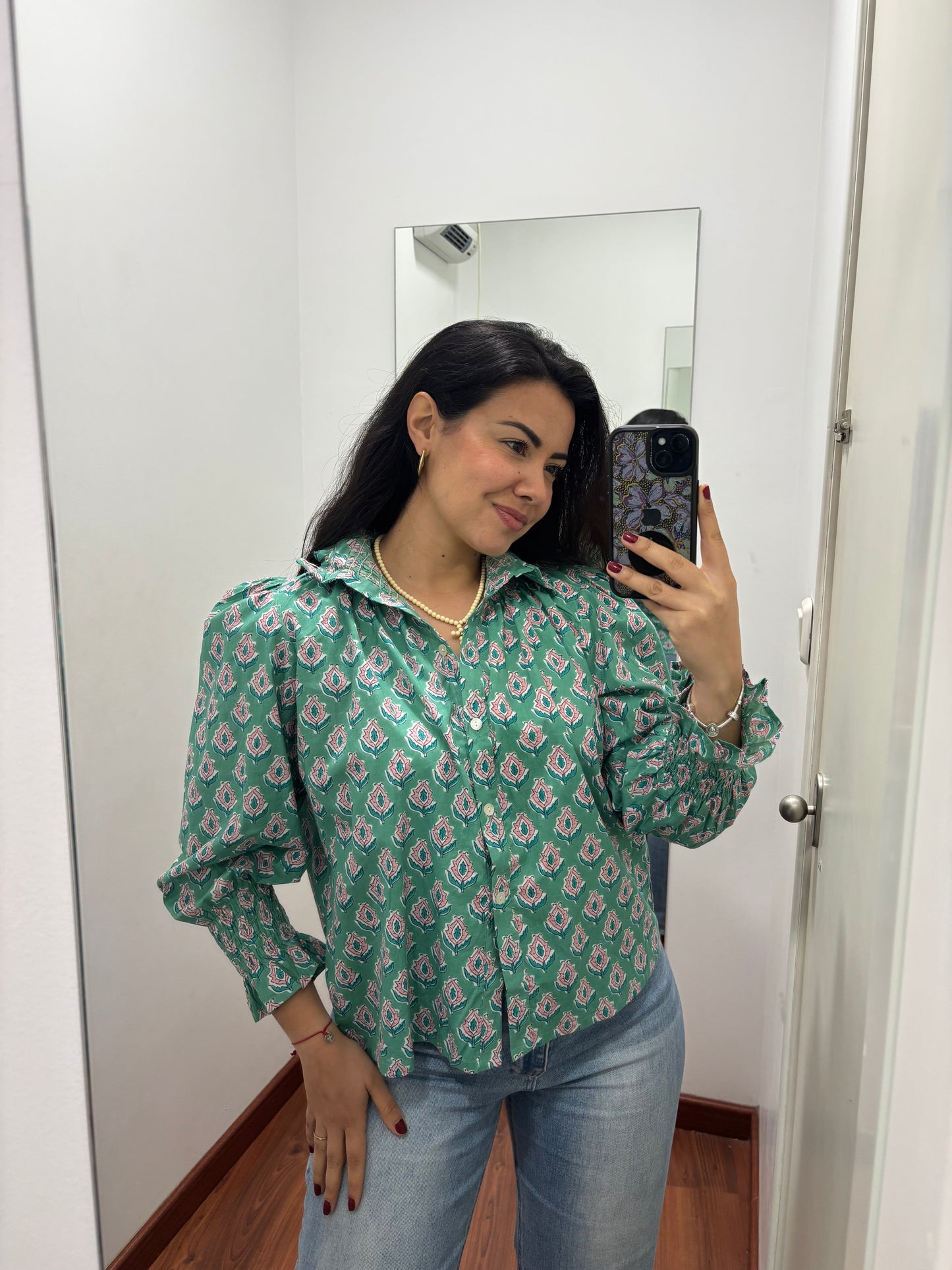 Blusa cuello turquesa