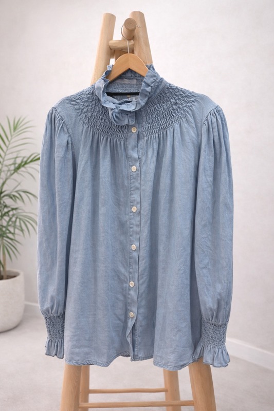 Blusa cuello subido vaquera
