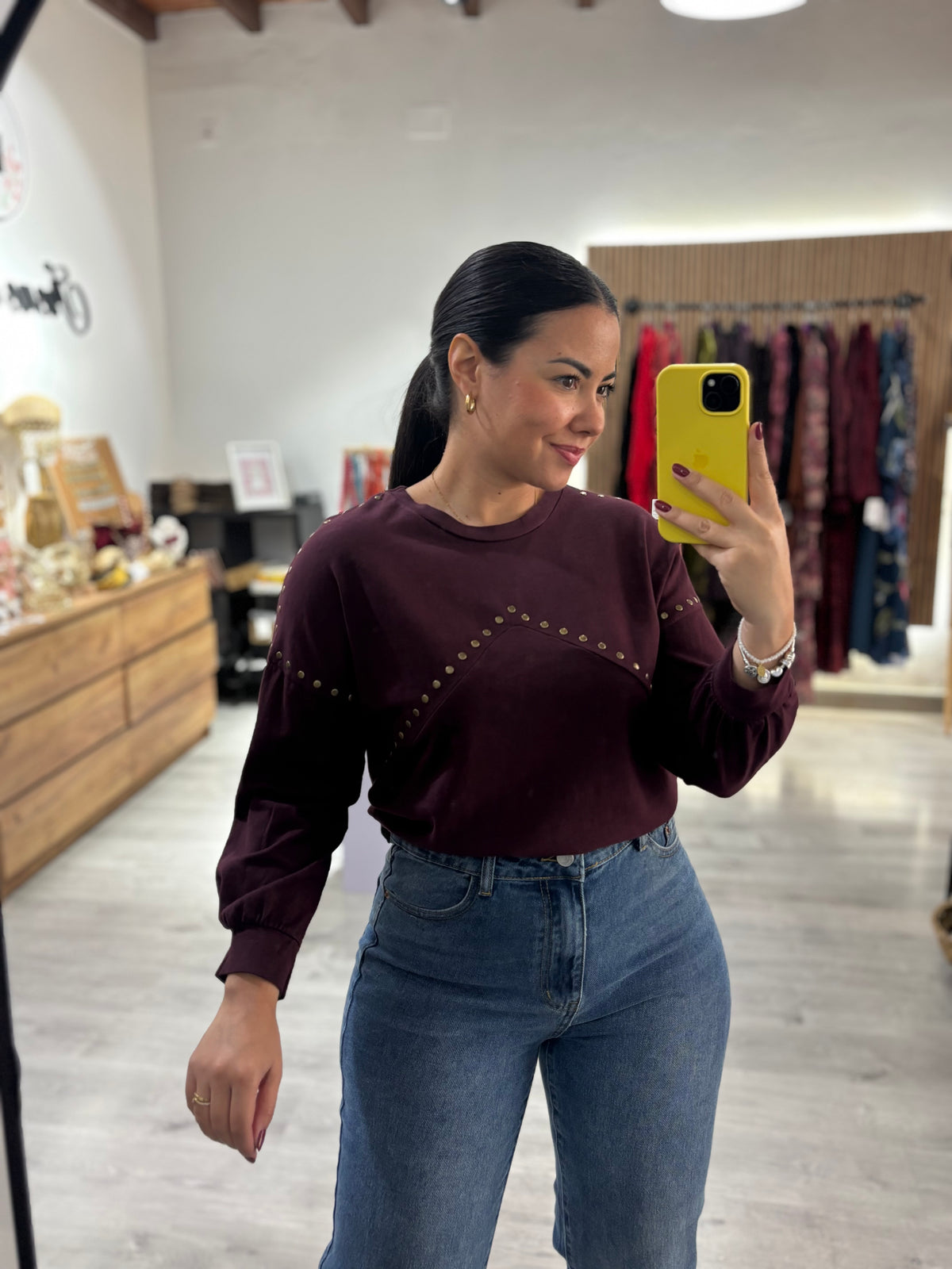 Sudadera tachuelas