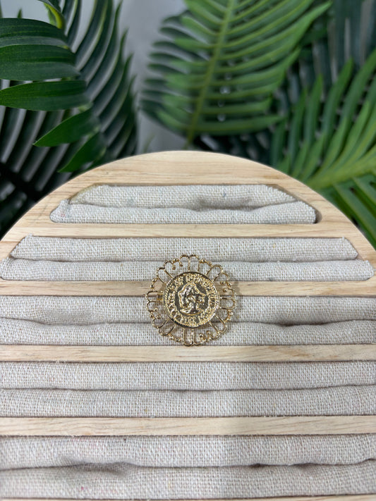 Broche moneda