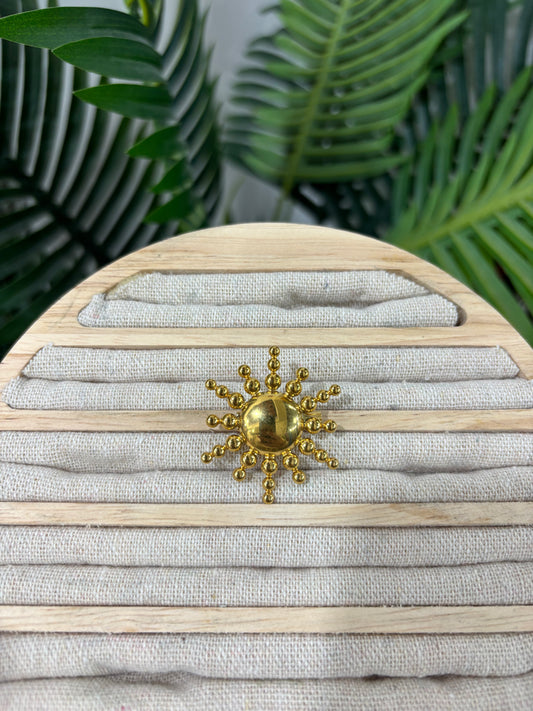 Broche sol